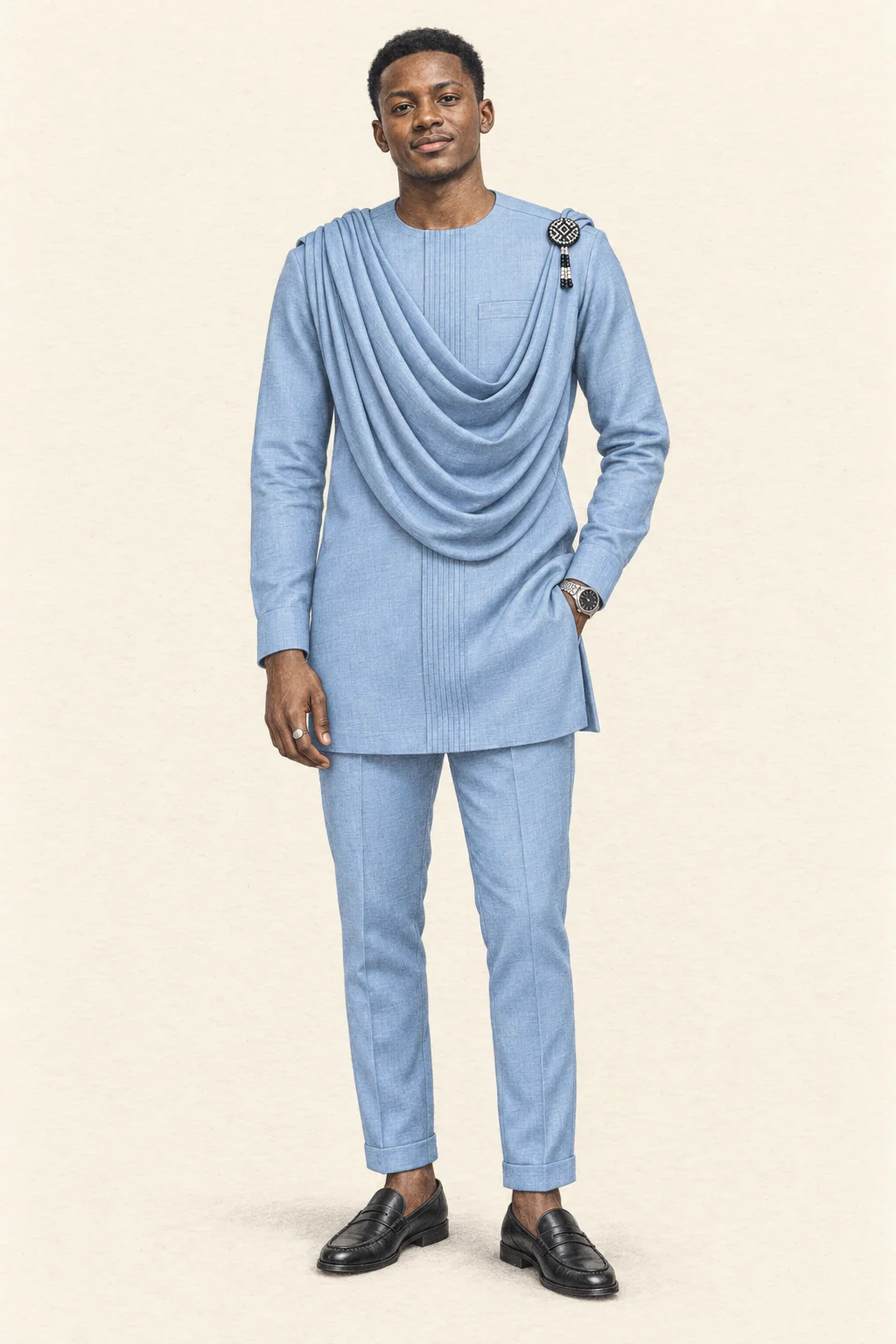 Fictional Rwandan man in a powder-blue draped tunic suit, black loafers and silver accessories.
